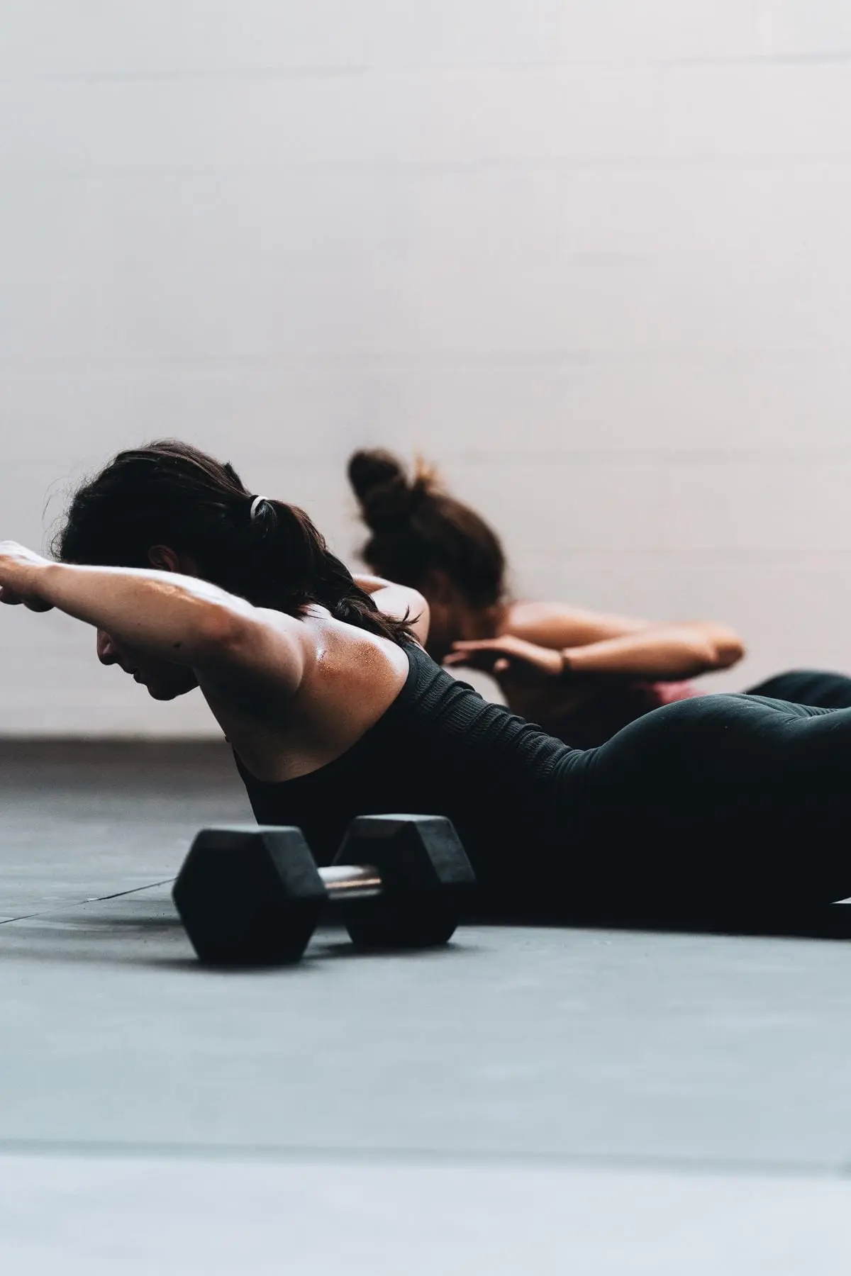 An image of a person performing a High Intensity Interval Training (HIIT) workout with various exercises.